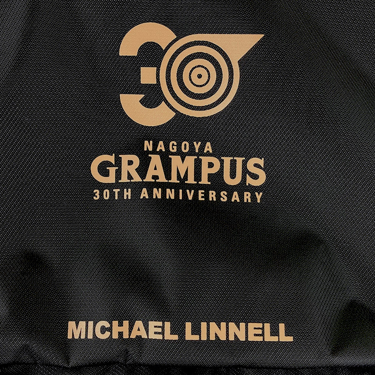 30周年記念ロゴ マイケルリンネル トラベルポーチ